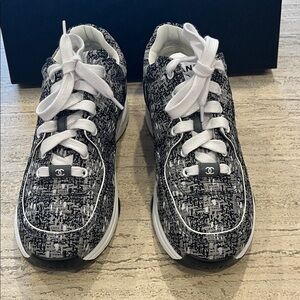 CHANEL Stylish Black and White Sneakers